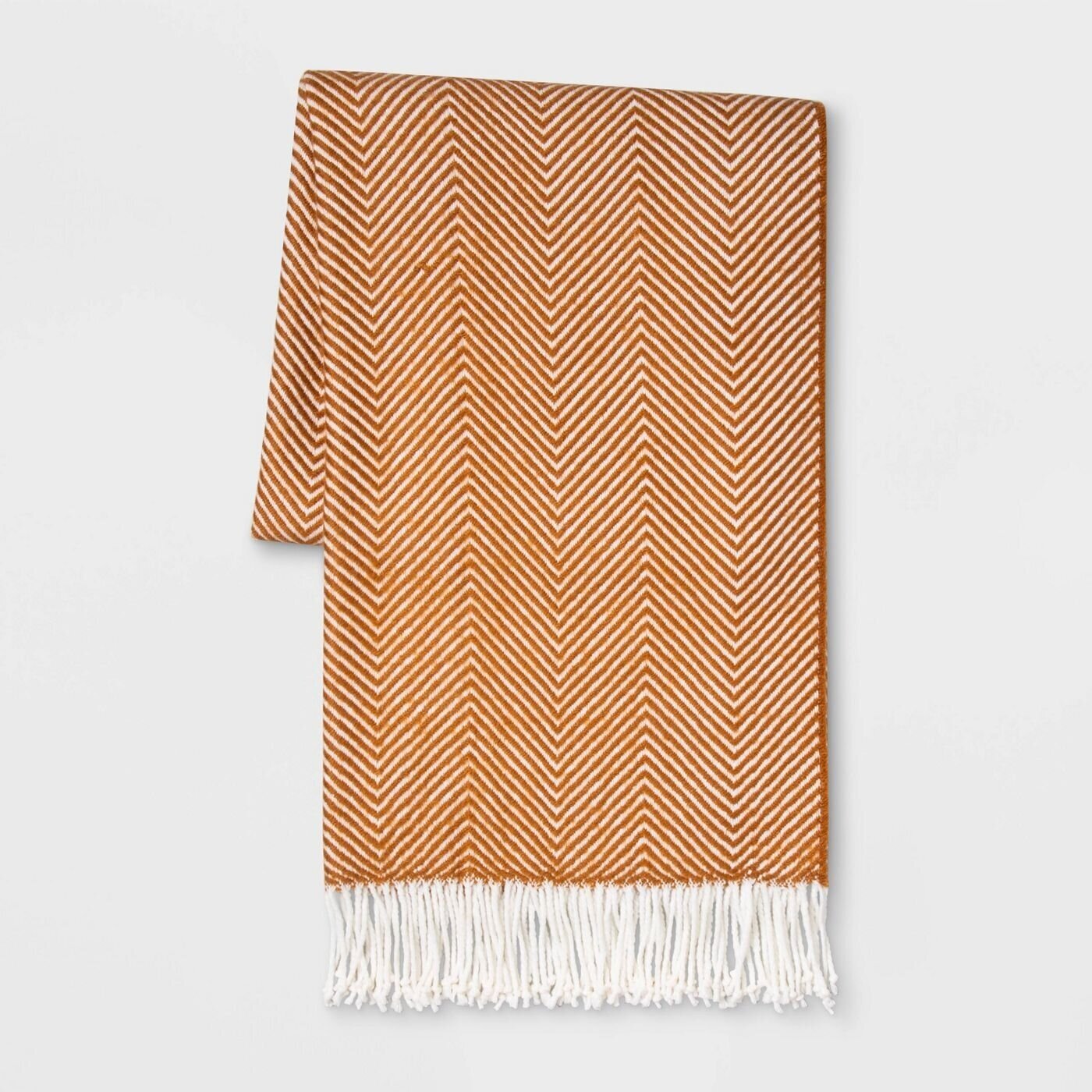 It wouldn’t be a fall blog post with a few mentions of blankets, right? I love this cozy and affordable throw blanket that screams fall but doesn’t break the bank.