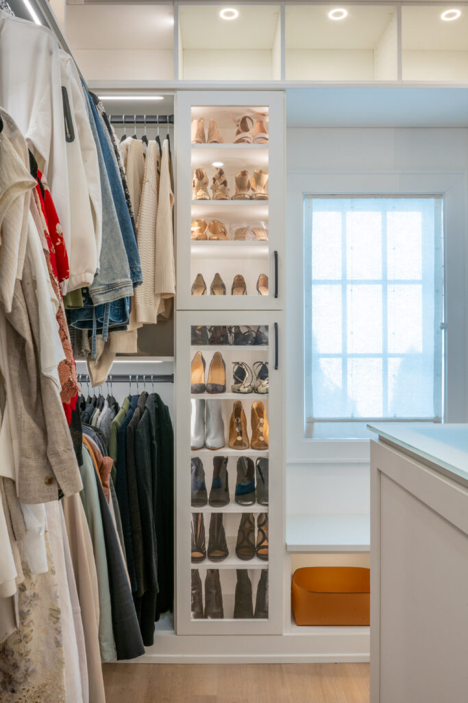 Functional closet design with organized shelving and hanging space