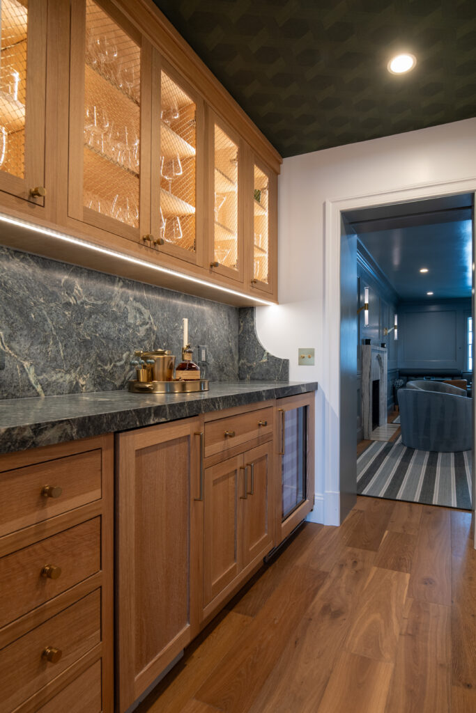 White-glove move management team setting up a functional kitchen in DC home