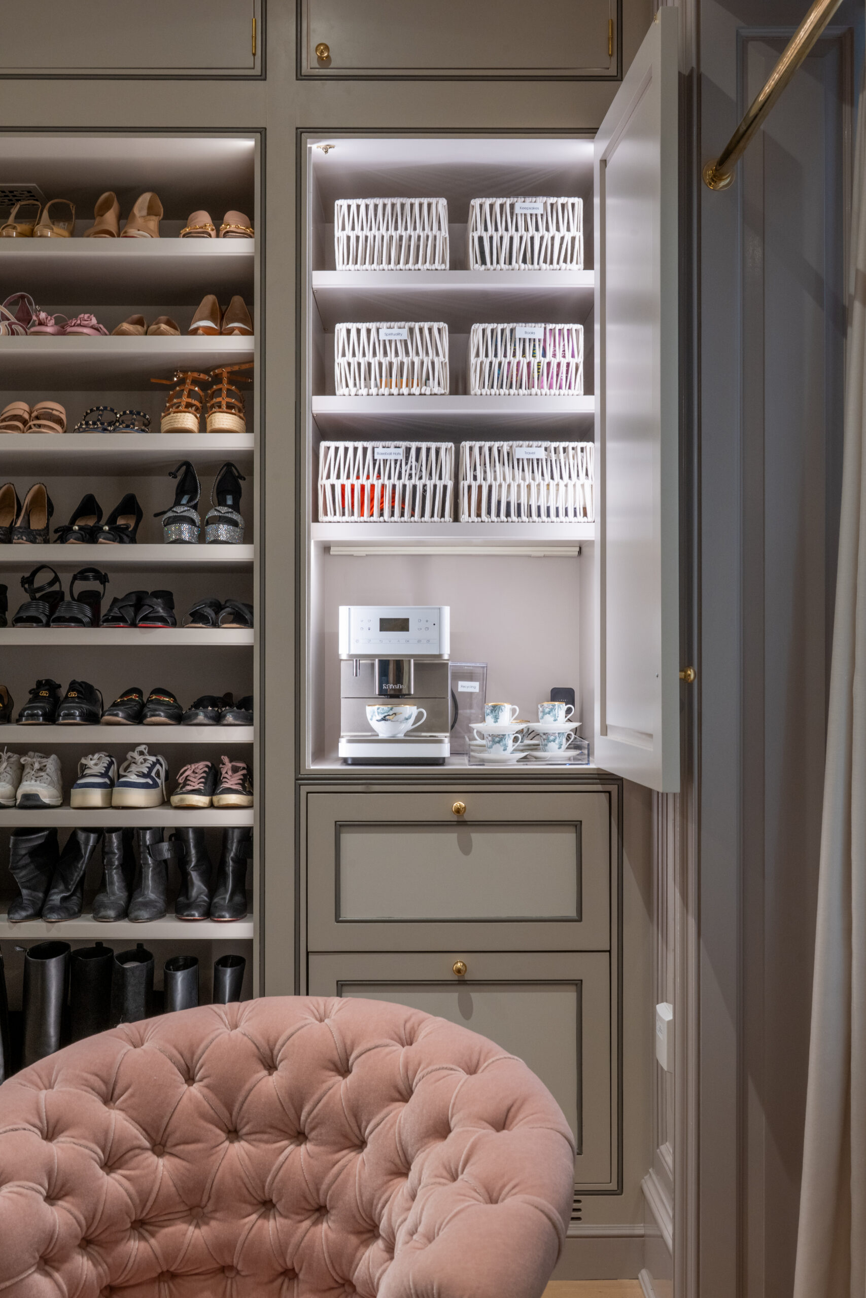 Modern luxury closet featuring custom cabinetry and shelving